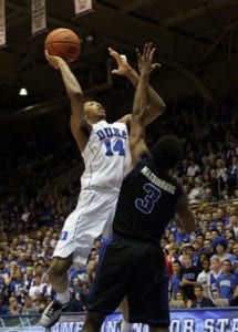 Duke's Brandon Ingram (14) shoots over Buffalo's CJ Massinburg during an NCAA college basketball game in Durham, N.C., Saturday, Dec. 5, 2015. (AP Photo/Ted Richardson)