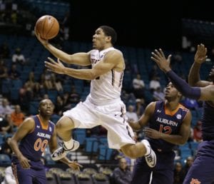 Oregon State's Malcolm Duvivier goes up for a shot against Auburn during the first half of an NCAA college basketball game Wednesday, Nov. 26, 2014, in Las Vegas. (AP Photo/John Locher)