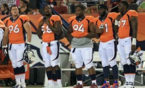 DENVER, CO - AUGUST 29: Defensive players Mitch Unrein #96, outside linebacker Von Miller #58, defensive tackle Terrance Knighton #94, defensive end Robert Ayers #91 and defensive end Malik Jackson #97 of the Denver Broncos look on from the sidelines against the Arizona Cardinals during preseason action at Sports Authority Field at Mile High on August 29, 2013 in Denver, Colorado. (Photo by Doug Pensinger/Getty Images)