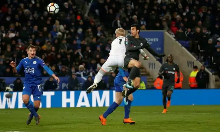 Pedro's header in extra time lifts Chelsea to a 2-1 victory over Leicester City