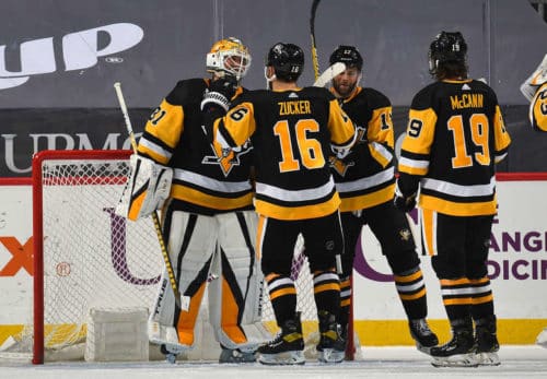 Maxime Lagace celebrating with Penguins after his first shutout