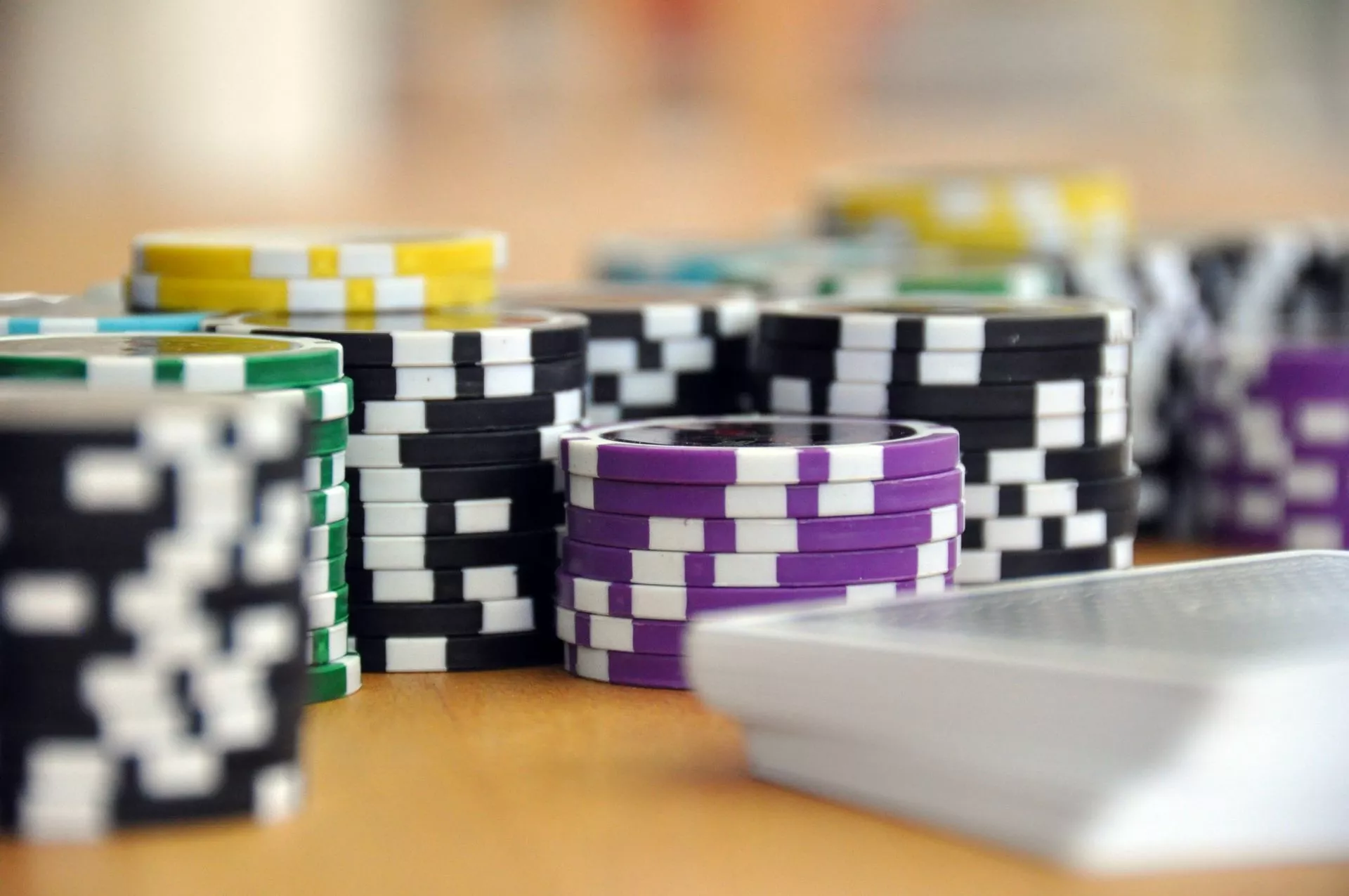 Photo by Pixabay: https://www.pexels.com/photo/blue-green-and-purple-poker-chips-39856/